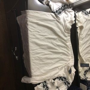 Black and white American eagle off the shoulder